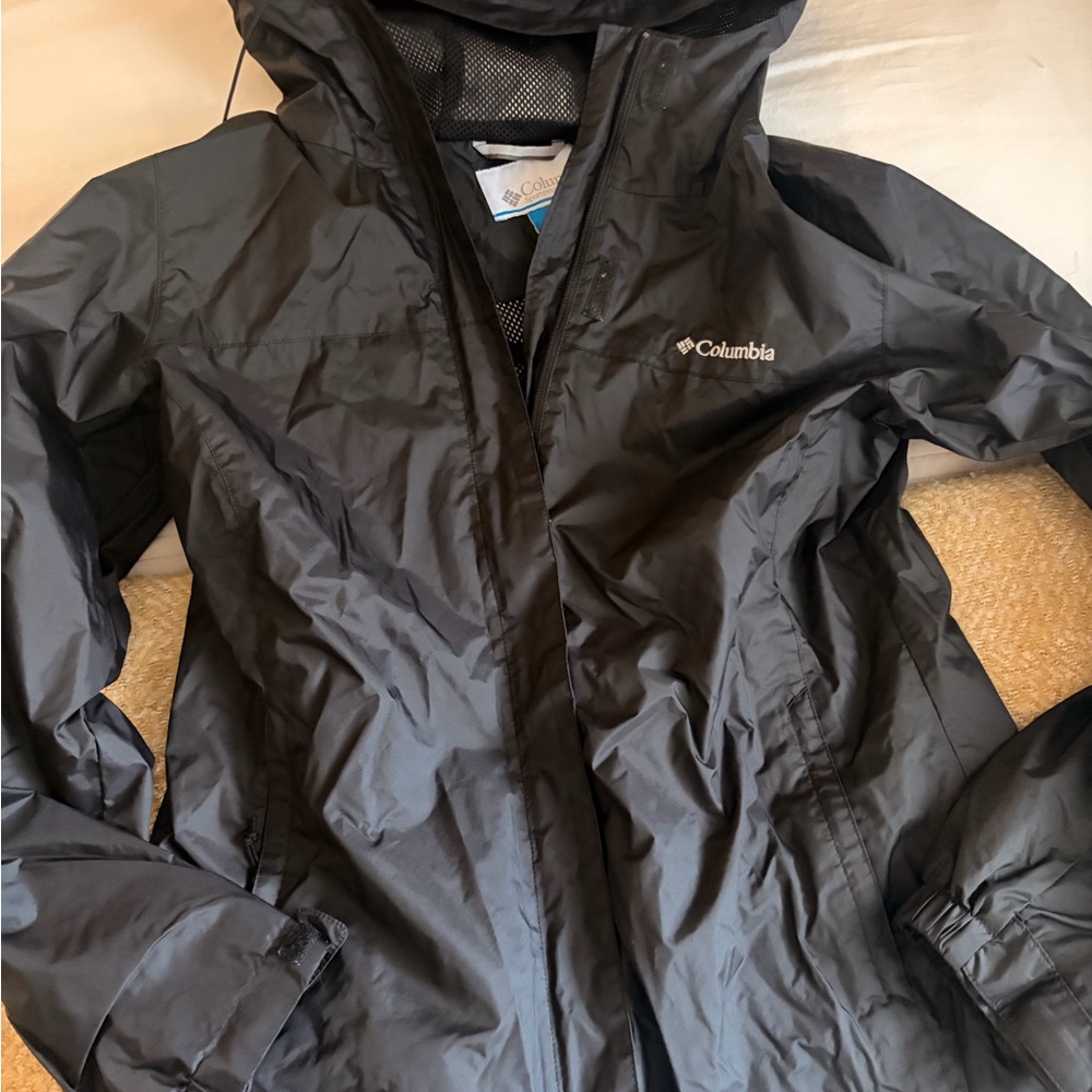 Columbia Black Jacket with Blue Logo Tag
